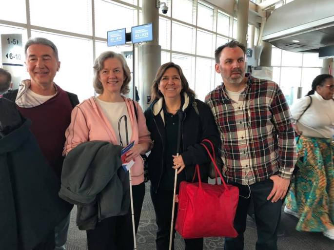 Michael, Bonnie, Alma and David waiting at gate in IAH airport