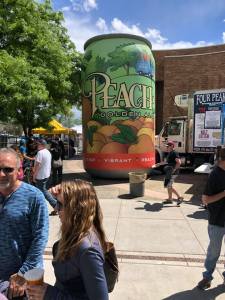 Giant 3D blowup of Peach Golden Ale can