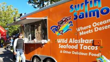 Michael ordering fish tacos at Surfing Salman food truck